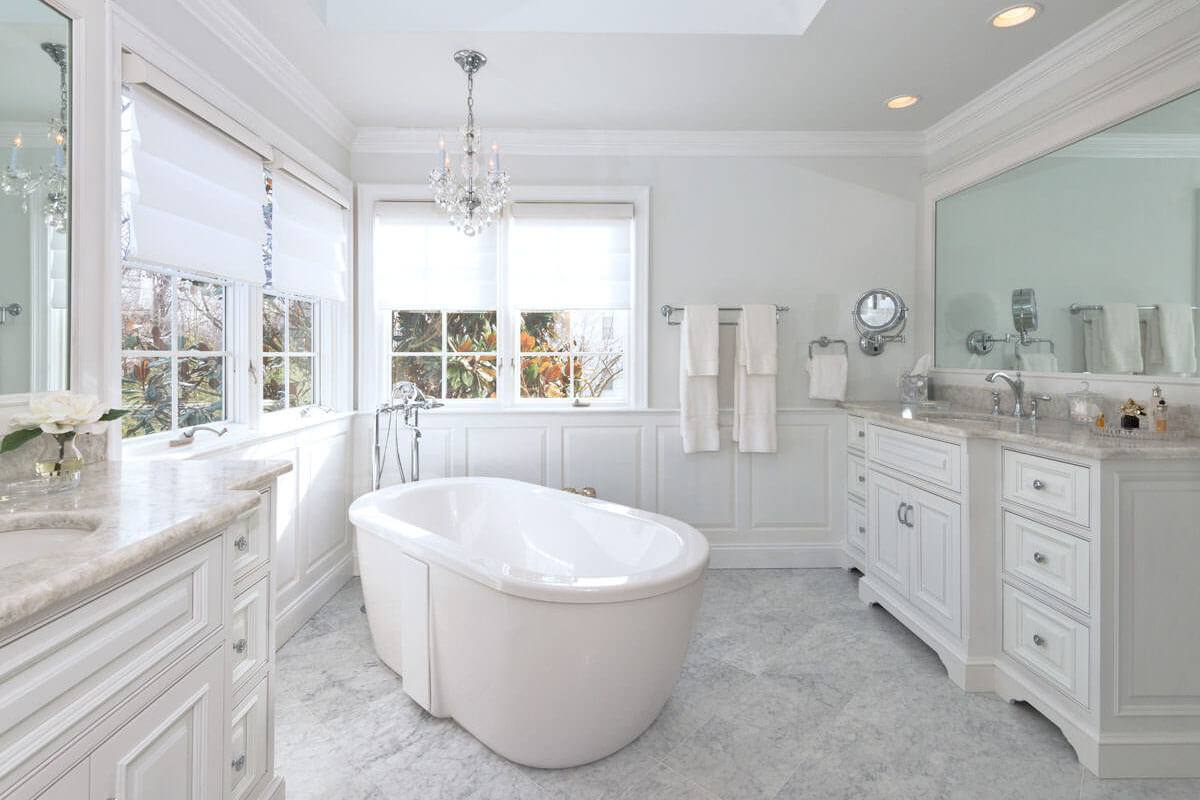 Antartide and Carrara stone installed across a bathroom vanity