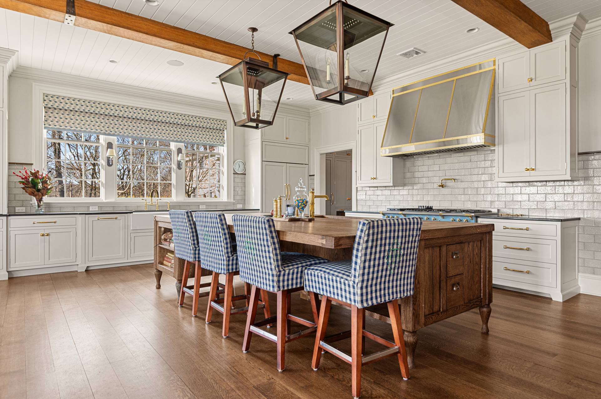 Kitchen with Black Absolute granite perimeter counters and a wood island
