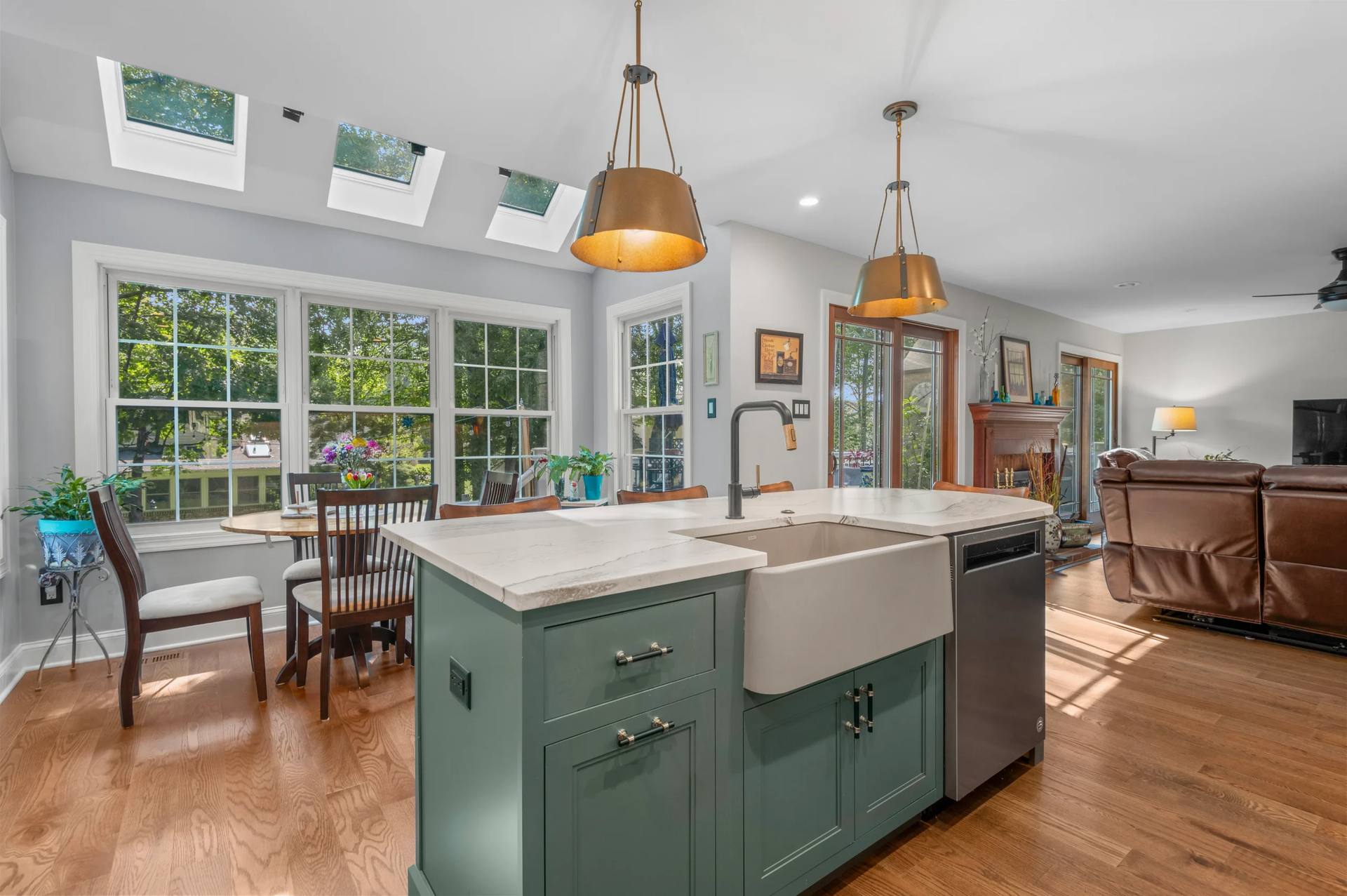 Apron sink set into a Cambria Windsor Brass quartz island