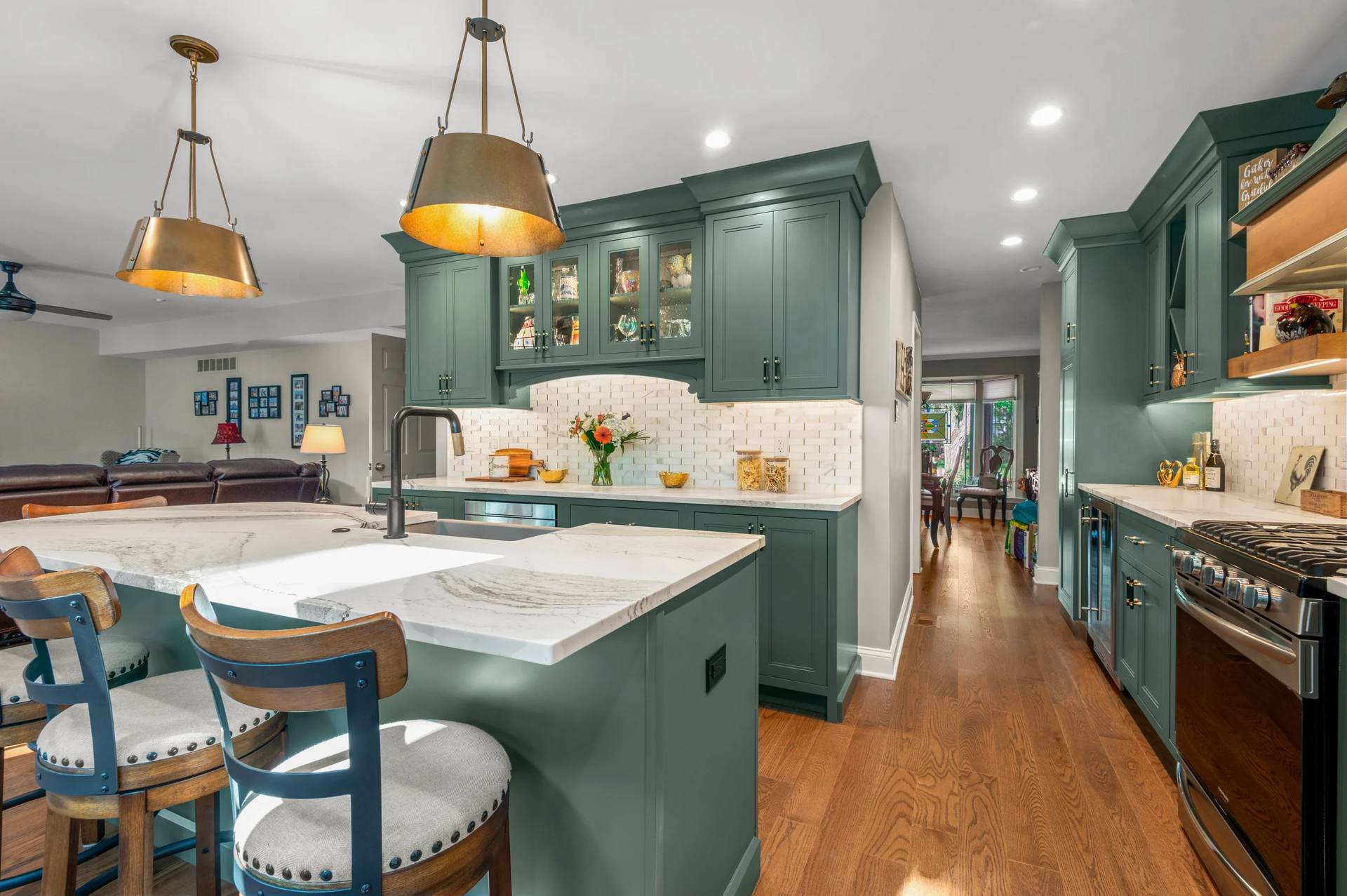 Cambria Windsor Brass quartz countertops with a curved kitchen island