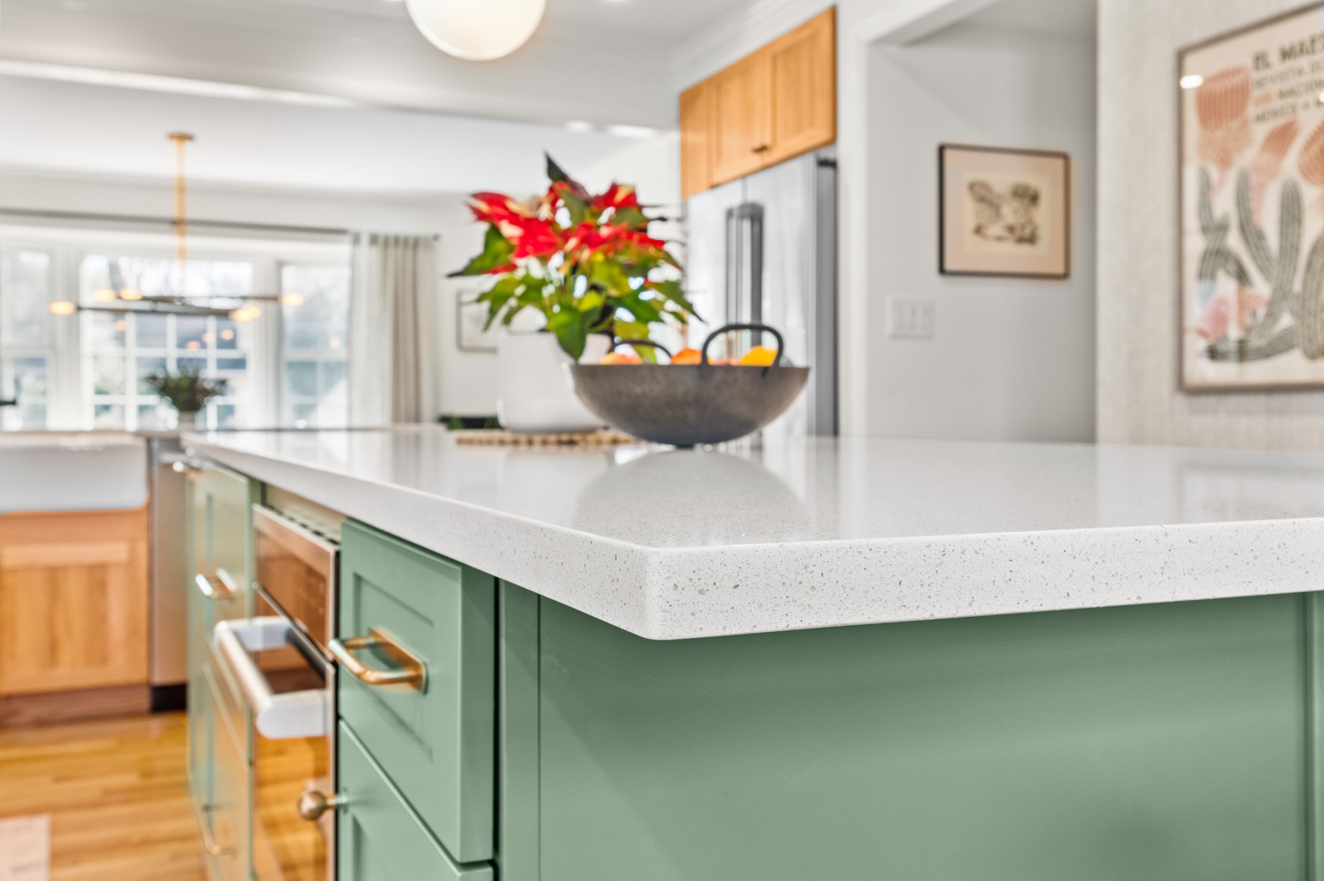 Caesarstone quartz countertop on a green kitchen island