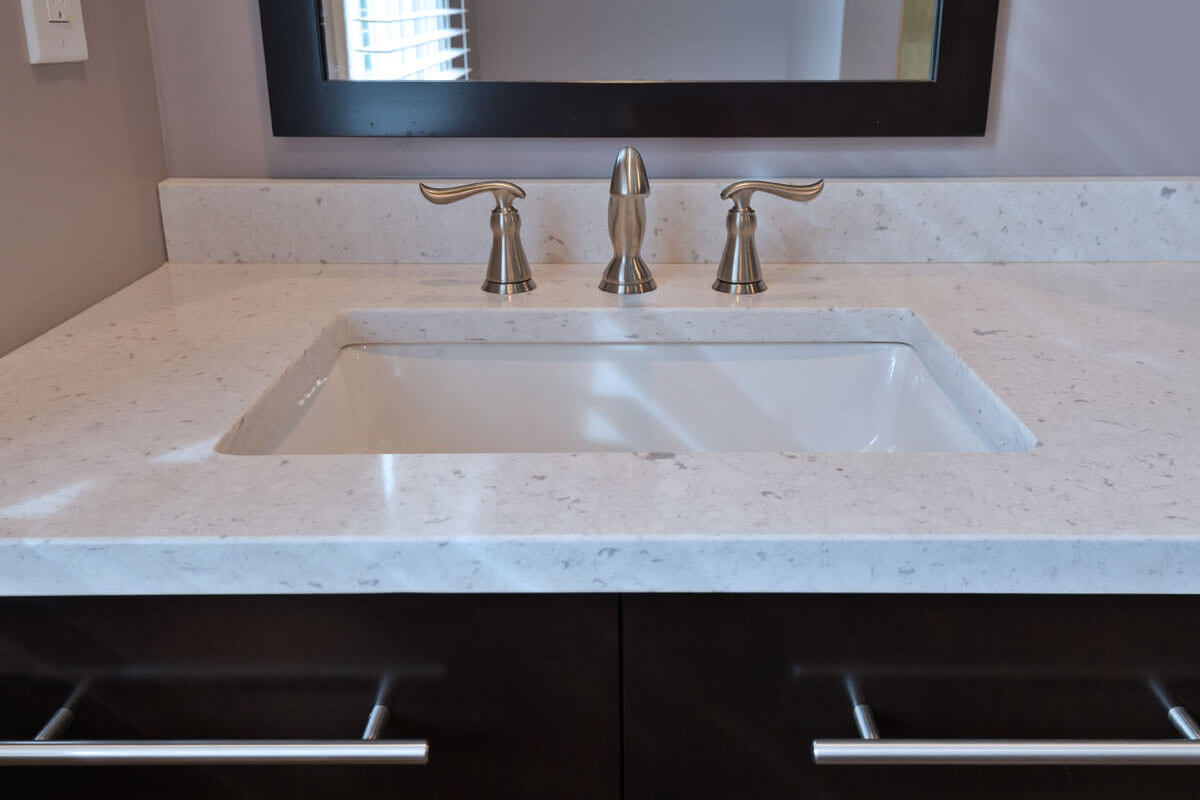 Close view of a sink opening in the Silestone vanity countertop