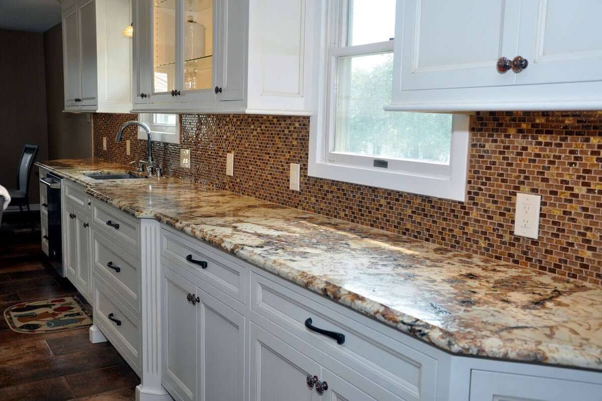 Leathered Splendor Gold granite counter running below a window