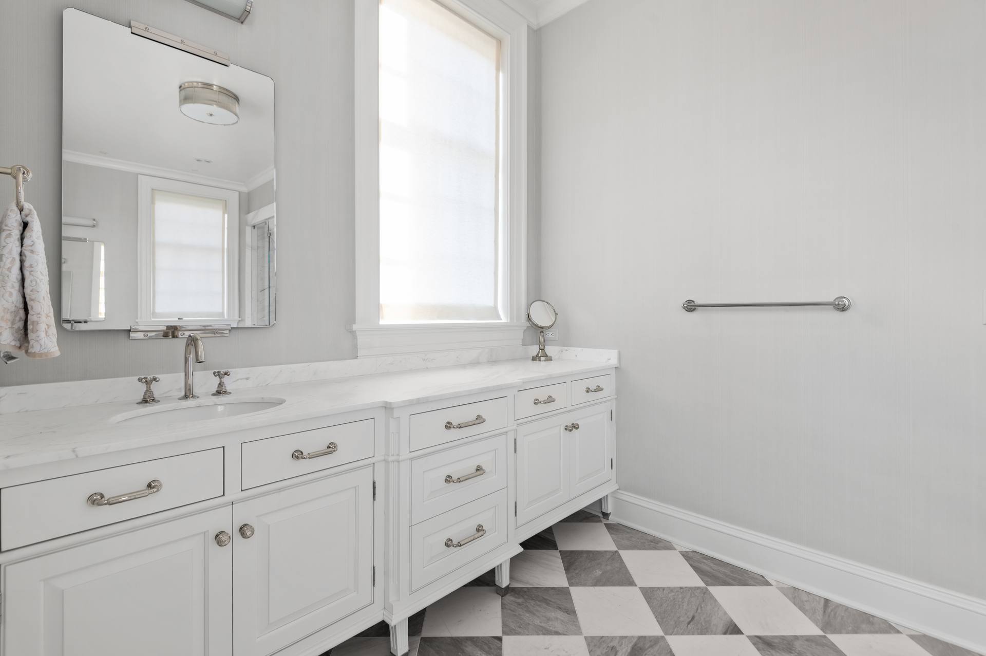 Thassos marble vanity top with matching marble wall panels