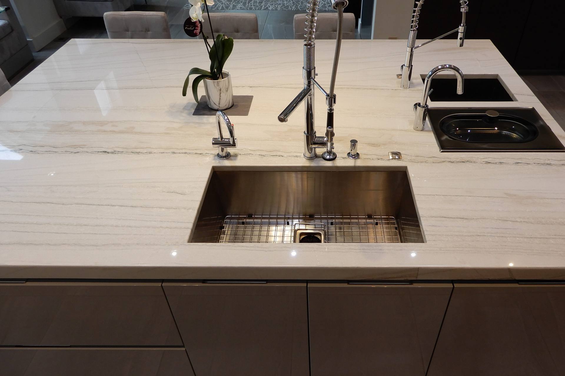 Undermount sinks set into a White Macaubas quartzite island