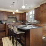 Kitchen,In,Luxury,Home,With,Oak,Wood,Cabinetry
