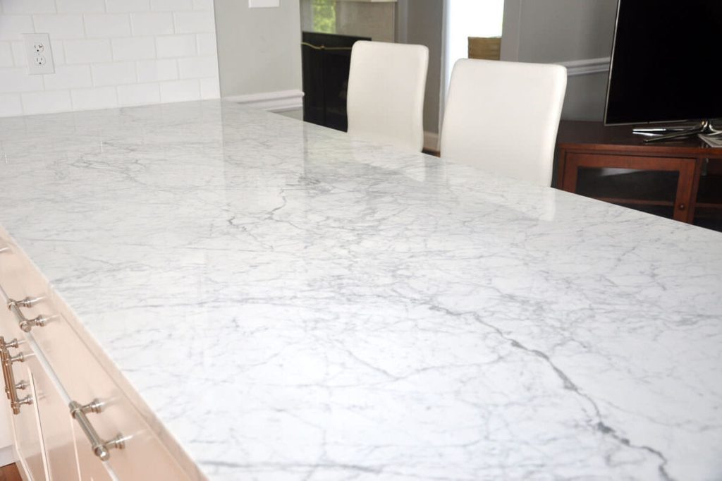 Bianco Carrara marble dining table with gray veining