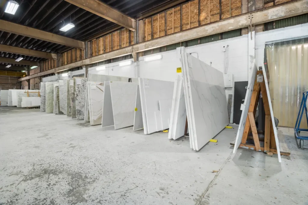 Stone slab racks inside the Cosmos warehouse